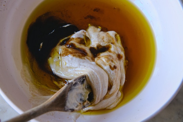 sourdough discard, maple syrup, vanilla, and olive oil in a mixing bowl