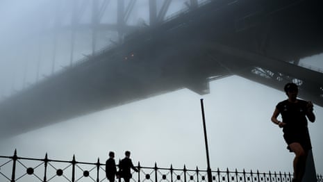 Blanket of fog rolls across Sydney harbour – video